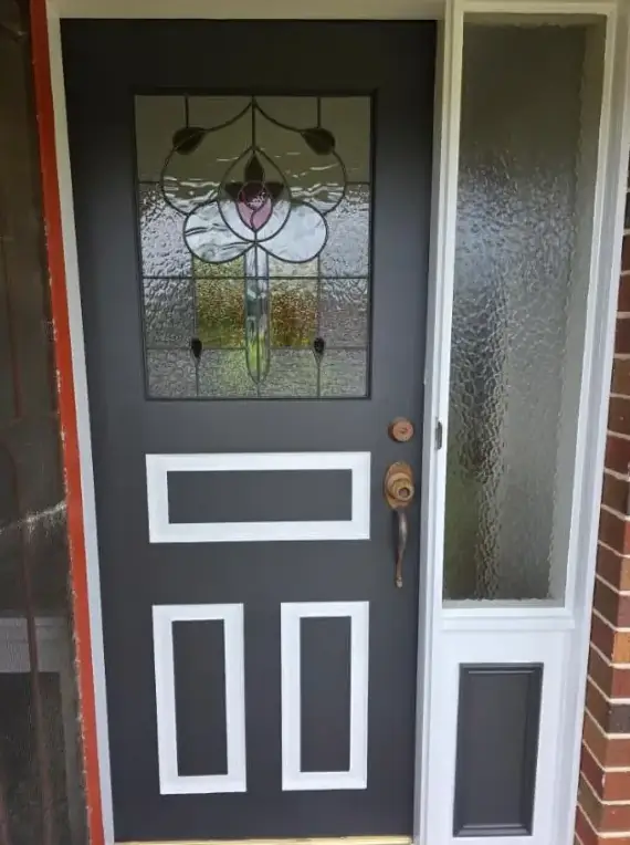 Repainted front door and timber trims with original leadlight glass