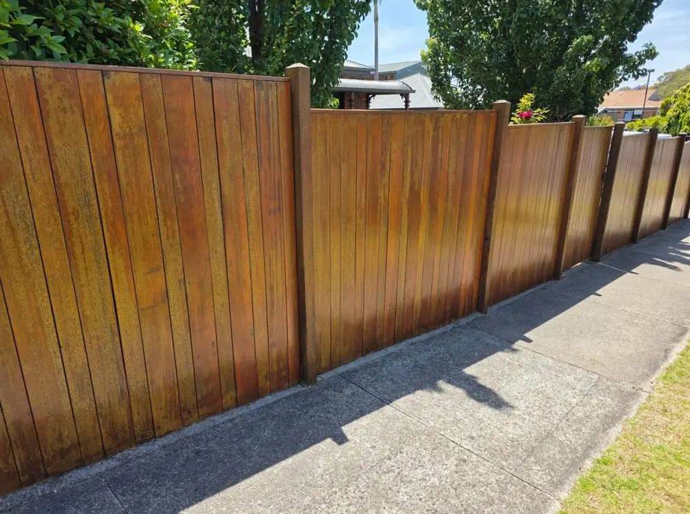 Restored and re-stained timber boundary fence in Highton, Geelong